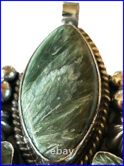 Signed Navajo Sterling Silver Five-Stone Rare Seraphinite Pendant